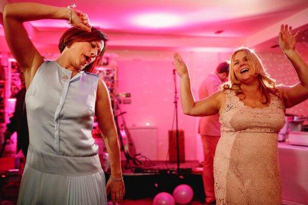 Wedding DJ service in Buckinghamshire and recommended supplier for Stoke Place luxury wedding venue - ladies dancing and having fun