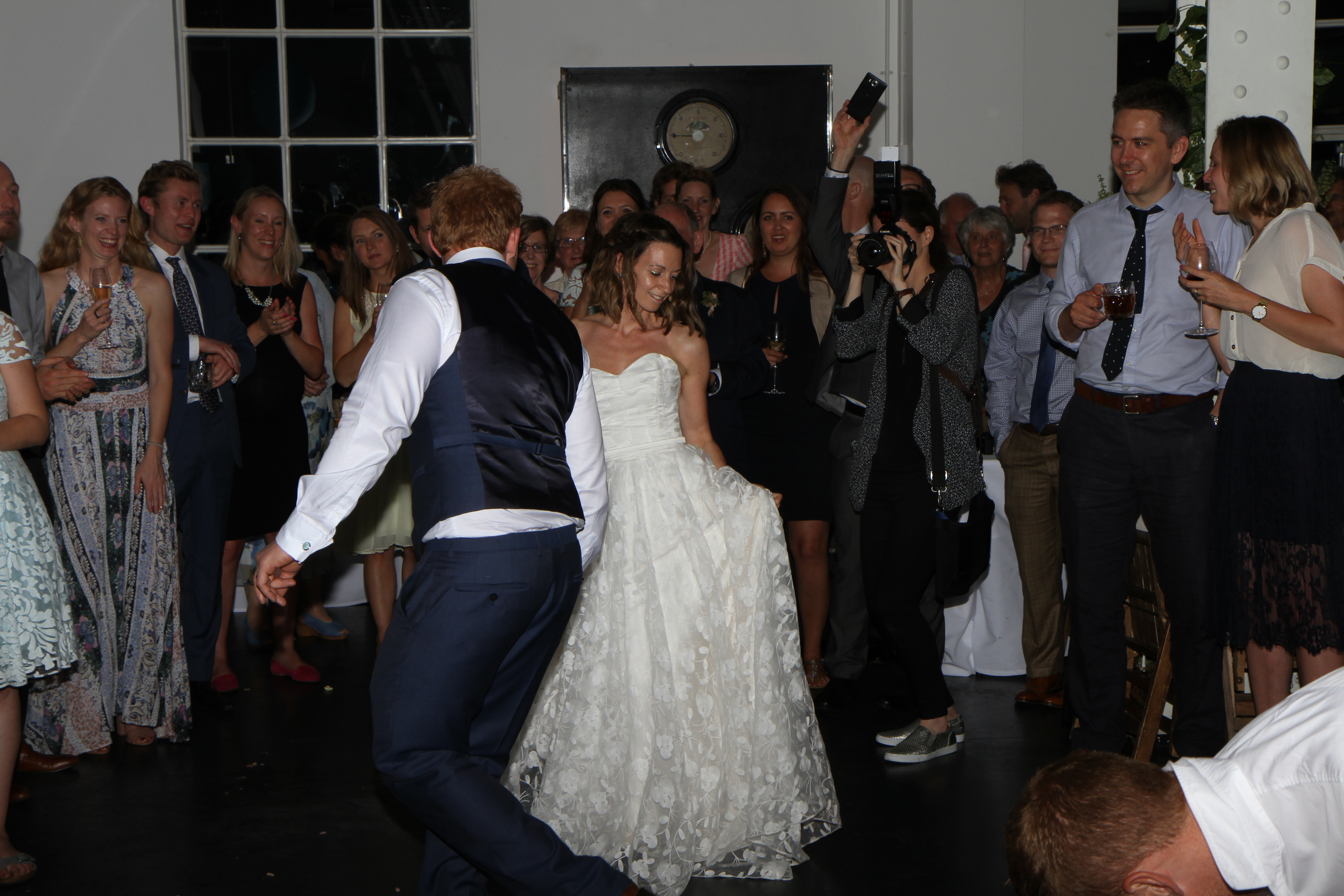Happy couple doing their first dance at their wedding with a Mighty Fine Events wedding DJ