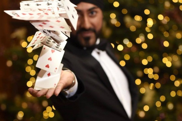 Magic Singh performs one of his card tricks