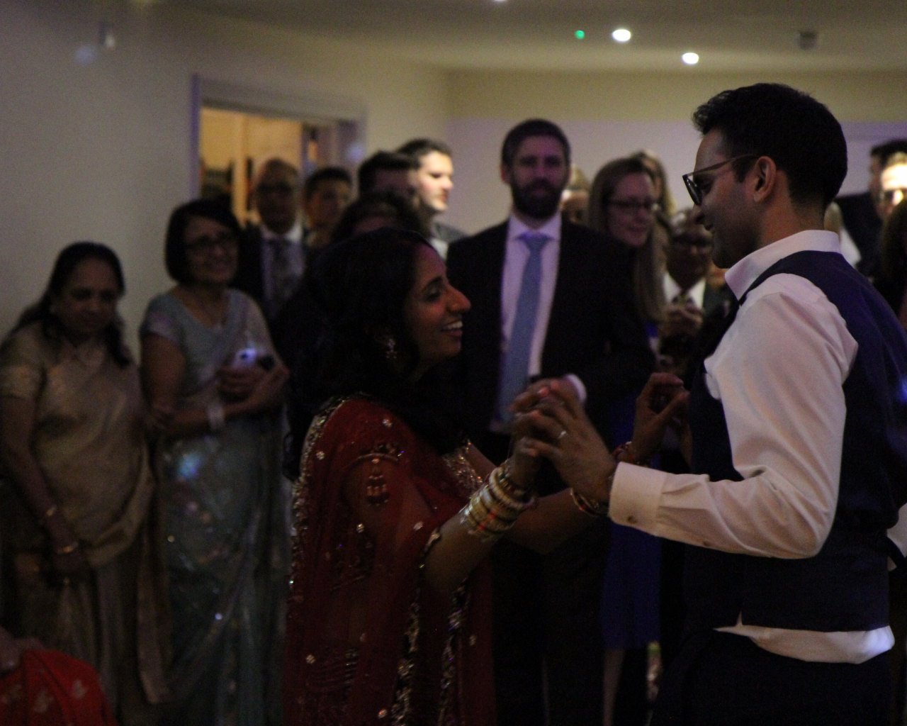 Wedding DJ plays first dance for a very happy couple at Millbridge Court luxury wedding venue in Surrey