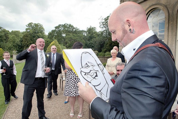 Artist draws caricatures of Wedding guests perfect for Corporate Event