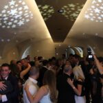 Wedding guests dance to a Mighty Fine DJ at Queens House London