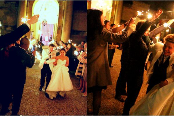 Blenheim Palace wedding is celebrated with sparklers held by friends and family