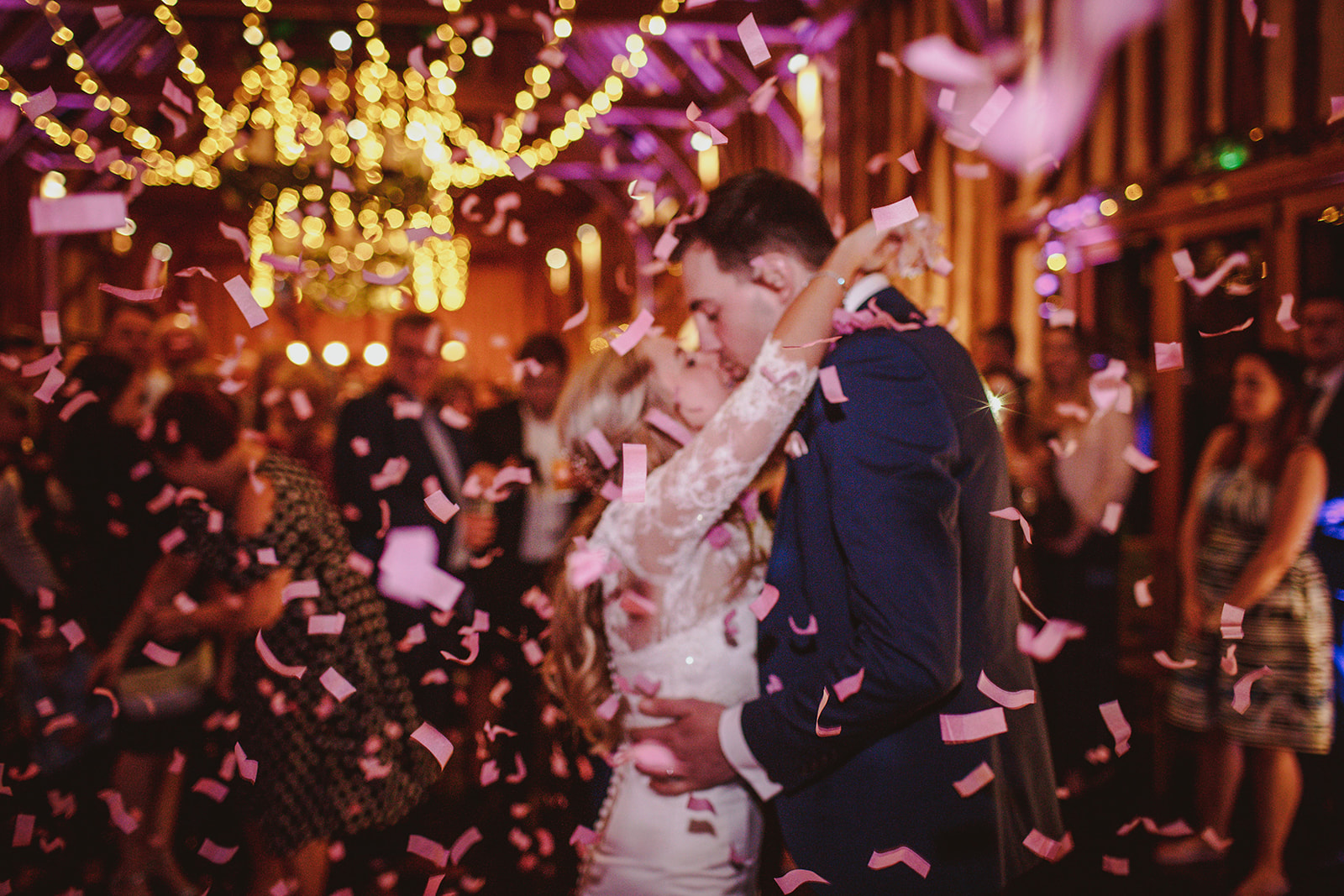 Wedding DJ at Lillibrooke Manor luxury Berkshire barn wedding venue - wedding couples first dance with confetti
