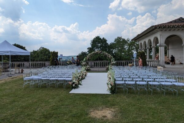 Wedding DJ at production for outdoor ceremony at Cliveden House luxury Berkshire wedding venue