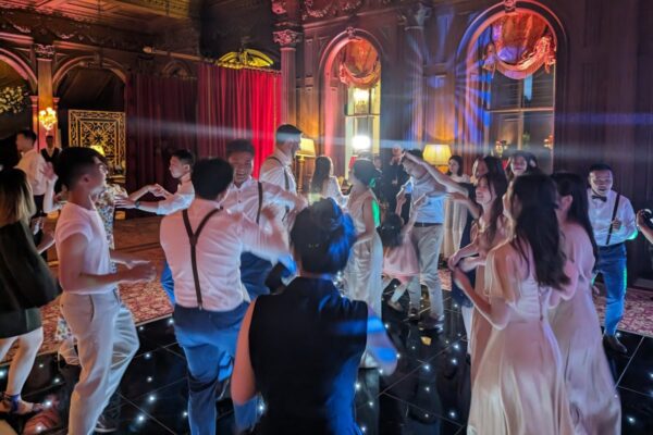 Wedding DJ Cliveden House Berkshire wedding venue - luxury live entertainment - guests dancing on black LED dance floor