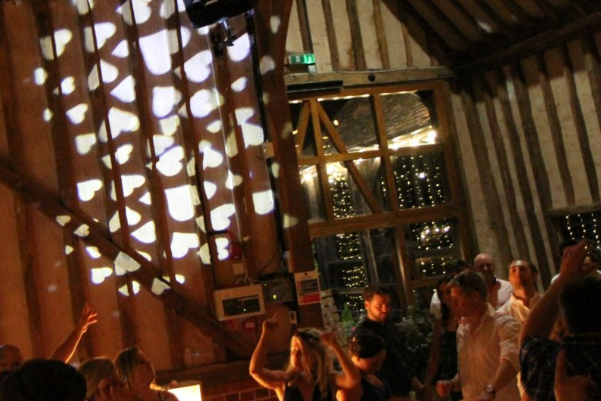 Wedding DJ at Lillibrooke Manor barn wedding venue in Berkshire - light projections on dance floor