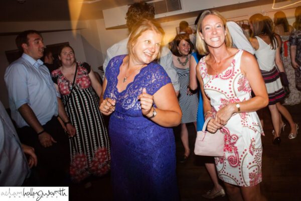 Wedding DJ at Stoke Place wedding venue in Buckinghamshire - guests dancing and having fun