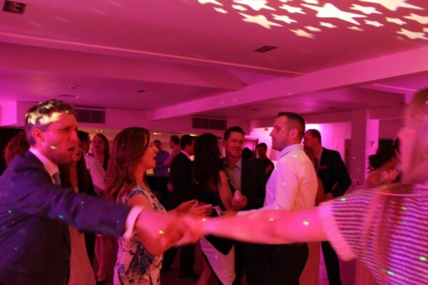 Wedding DJ at Stoke Place wedding venue in Buckinghamshire - guests dance moves