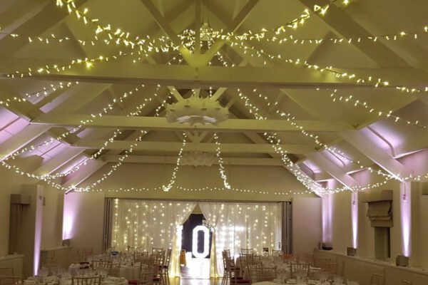 Wedding DJ at Stoke Place wedding venue in Buckinghamshire - ceiling fairly lights