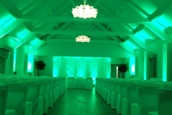 Wedding DJ at Stoke Place wedding venue in Buckinghamshire - green lighting for ceremony