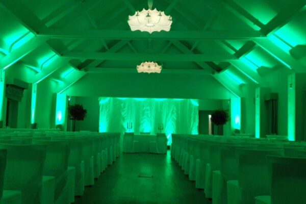 Wedding DJ at Stoke Place wedding venue in Buckinghamshire - green mood lighting