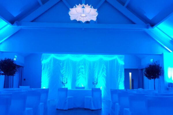 Wedding DJ at Stoke Place wedding venue in Buckinghamshire - blue mood lighting