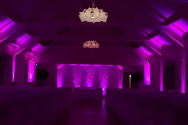 Wedding DJ at Stoke Place wedding venue in Buckinghamshire - purple mood lighting for ceremony