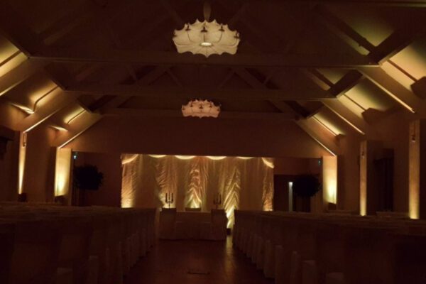 Wedding DJ at Stoke Place wedding venue in Buckinghamshire - mood lighting in barn space