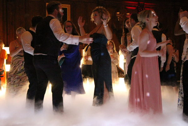 Wedding DJ and dancing on the clouds dry ice at Ashridge House luxury wedding venue in Hertfordshire