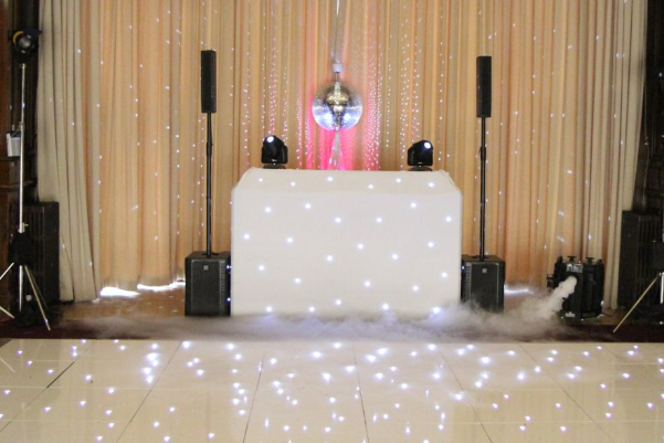 Wedding DJ setup with disco ball at Ashridge House luxury wedding venue in Hertfordshire