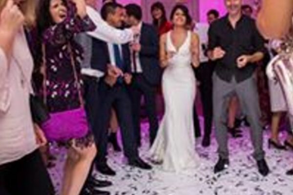 Wedding DJ at Cliveden House, Berkshire - bride enjoying a dance with wedding guests