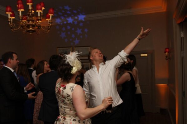 Wedding DJ at Cliveden House, Berkshire, luxury wedding venue - guests dancing