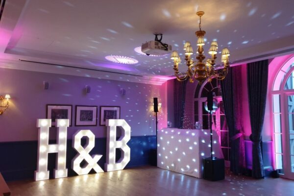 Wedding DJ at Cliveden House, Berkshire - DJ booth setup and large light up letters